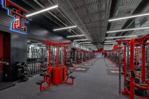 Inside the Texas Tech Sports Performance center with a view of weight racks and machines