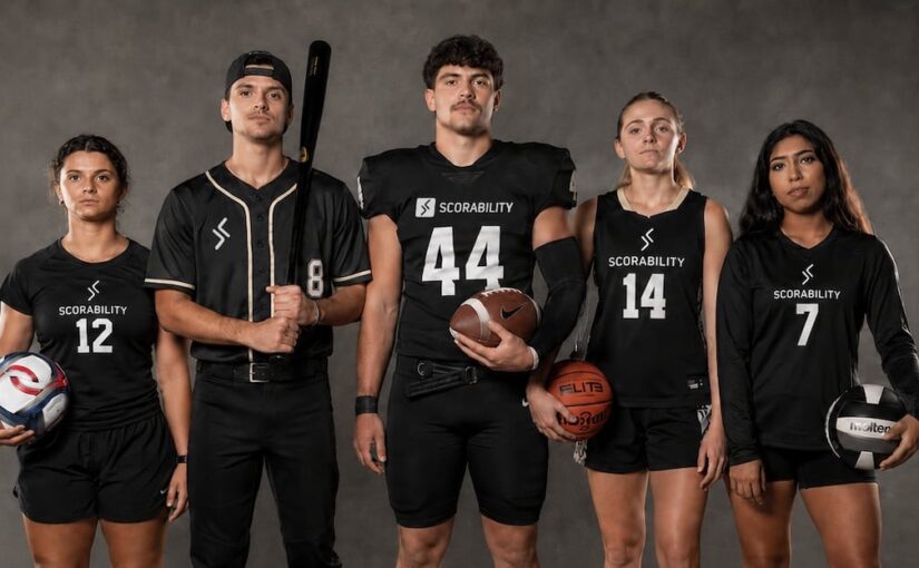 image shows five athletes standing in a line wearing and holding athletic equipment